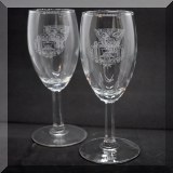 K05. 2 Naval Academy toasting flutes. 